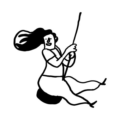 Eine Figur schwingt auf einer Reifenschaukel